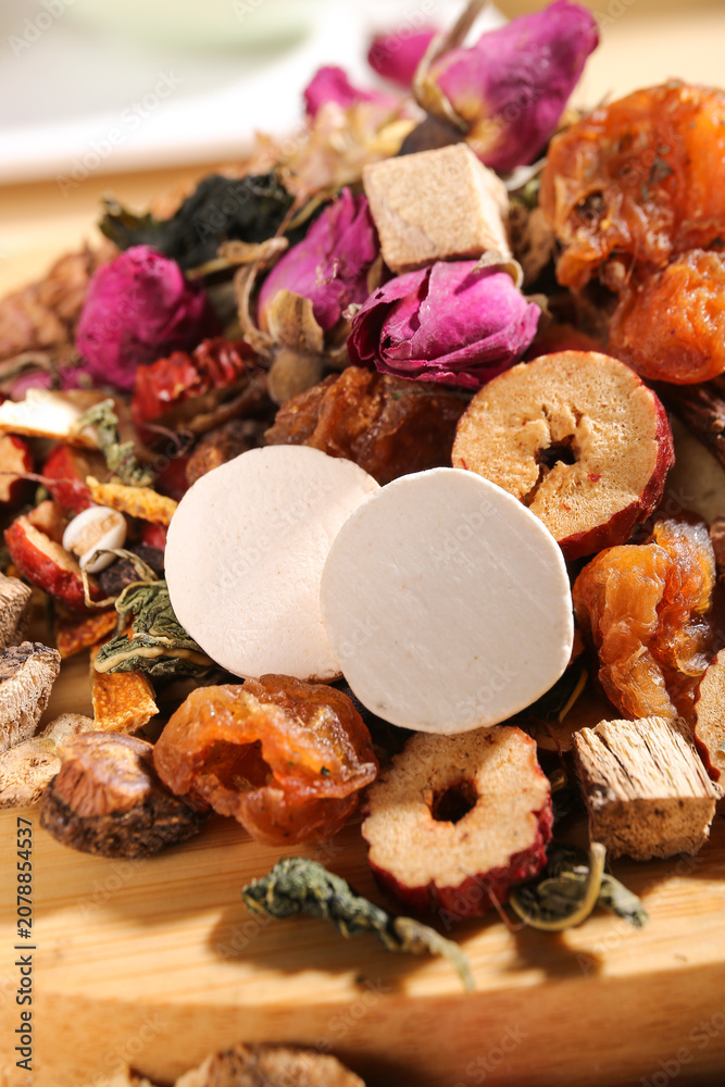 Fototapeta premium Traditional Chinese Tea Ingredients Variety - Dried Herbs Fruits Flowers for Nourishing Herbal Drinks Culture
