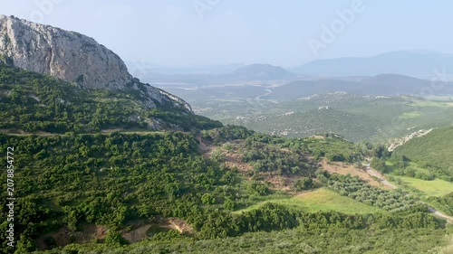 Central Greece pan across the green hills valleys farms villages