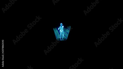 Hologram of a dancing person appears as a glowing blue light projection within a dark space.