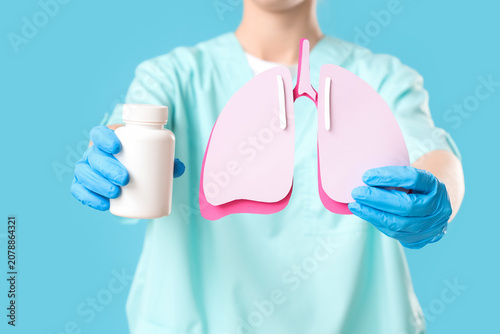 Female doctor with paper lu...