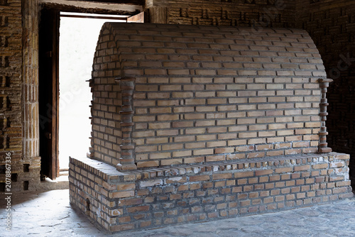 Photos Brick cenotaph inside the Samanid Mausoleum in Bukhara, Uzbekistan, showing intricate ancient brickwork