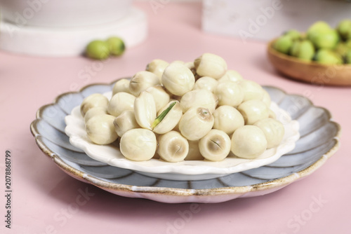 Fresh White Lotus Seeds on Decorative Plate - Healthy Asian Superfood Ingredient Still Life