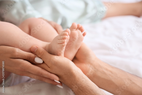 Mothers and fathers hands w...