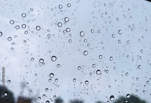 photo of rain droplets on glass, used for background textures.
