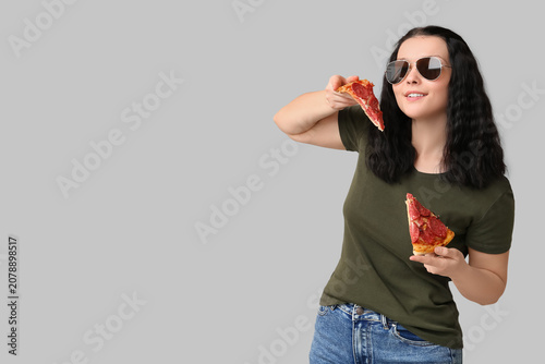 Young woman in sunglasses w...