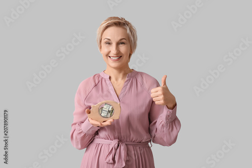 Beautiful mature woman with...