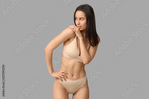 Beautiful young woman in li...