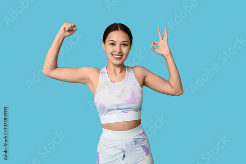 Young woman in sportswear s...