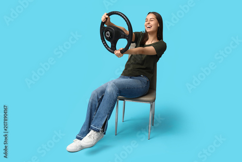 Happy young woman with stee...