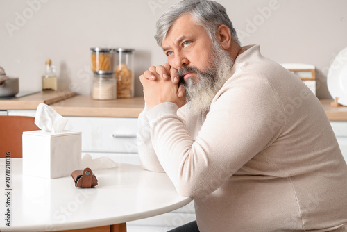 Portrait of sad senior man ...