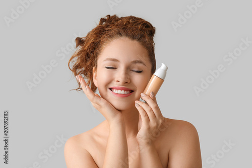 Young redhead woman with ma...