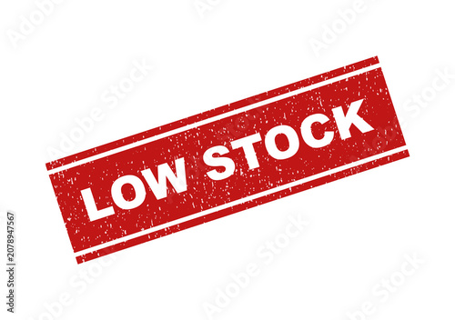 Cuadro en lienzo Red grunge rubber stamp with the text low stock for retail business
