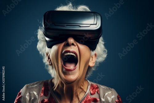 Astonished senior woman with virtual realty headset (VR). New Technology Concept, Cyber Glasses