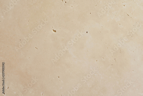 Foto Beige travertine stone surface texture with natural porous holes
