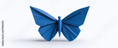 Blue origami butterfly on a clean white surface, traditional Japanese paper folding art symbolizing transformation and imagination.