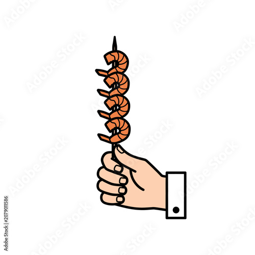 Hand holding a skewer of grilled shrimp.