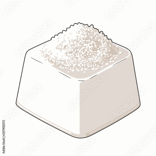 White sugar cube with granulated sugar on top.