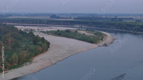 River Po exhibiting severely reduced water levels and exposed riverbeds from an intense summer heatwave and drought. Significantly diminishing the water flow through Lombardy and Emilia Romagna. Italy