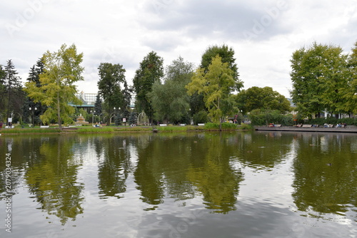 Scenic view of the Golitsynsky pond with lush green trees in Gorky Park, Moscow, Russia, 2015	 
