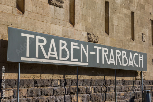 Tableau sur toile Sign with the city name at the historic gatehouse in Traben-Trarbach, Germany