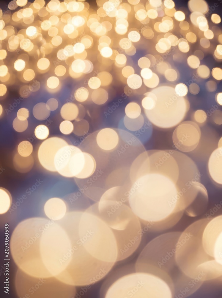 Fototapeta premium Golden bokeh lights background, blurred sparkling illumination