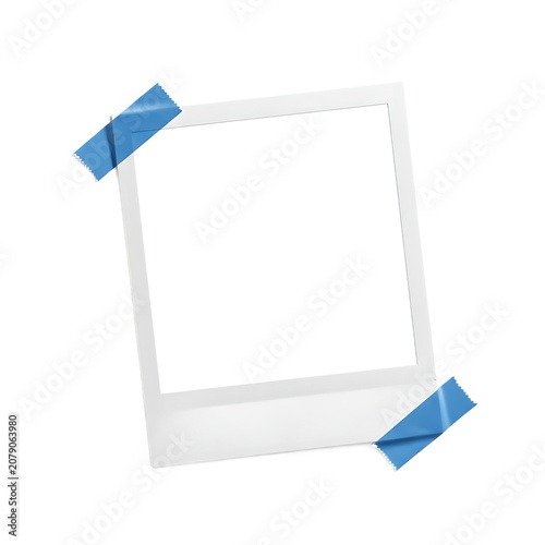 Blank polaroid photo frame with blue adhesive tape isolated on transparent background