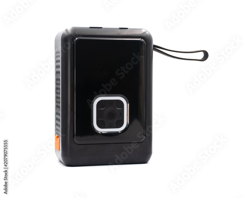 Portable car jump starter with air compressor on white background