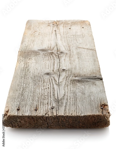 Close-up of a neatly folded white linen tablecloth with frayed edges.