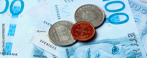 Obraz na plátně Swedish krona money bills and coins on table