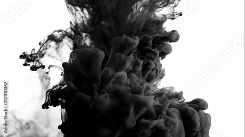 Black Ink Dissolving in Water on White Background
