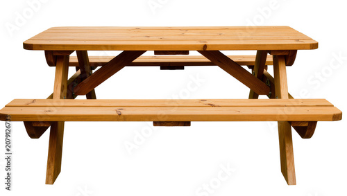 Schilderij op canvas Isolated wooden picnic table with attached benches for outdoor gatherings and ga