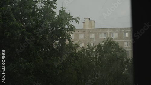 View and windows during the rain in summer. Dolly camera