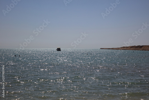The Sun reflecting on the water surface