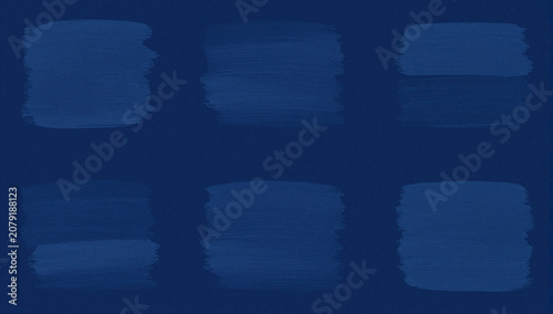 Dark blue, abstract brushstroke patterns on a navy background.