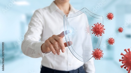 Картината върху платно Person touching transparent shield protecting against red virus particles