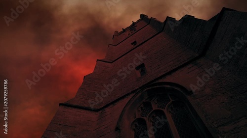 Medieval Tower With Fire And Smoke In The Sky
