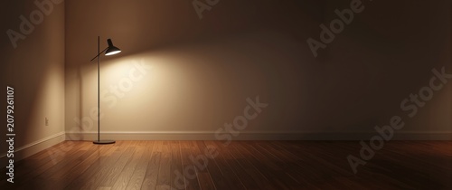 Vacant living space with wooden floor and floor lamp spotlighted for marketing use