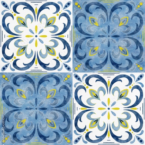 Decorative blue and yellow floral tile pattern with intricate swirls and shapes arranged in a symmetrical layout on a light background