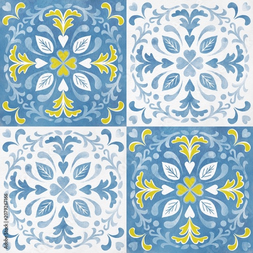 Decorative tile pattern featuring intricate floral designs in blue, white, and yellow colors arranged in a symmetrical layout on a textured background