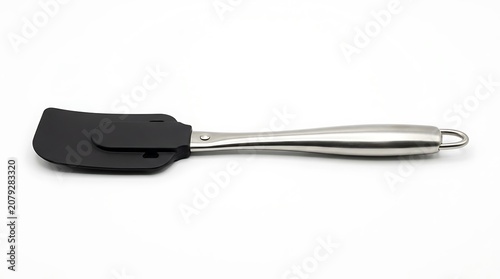 Black silicone spatula with metal handle.