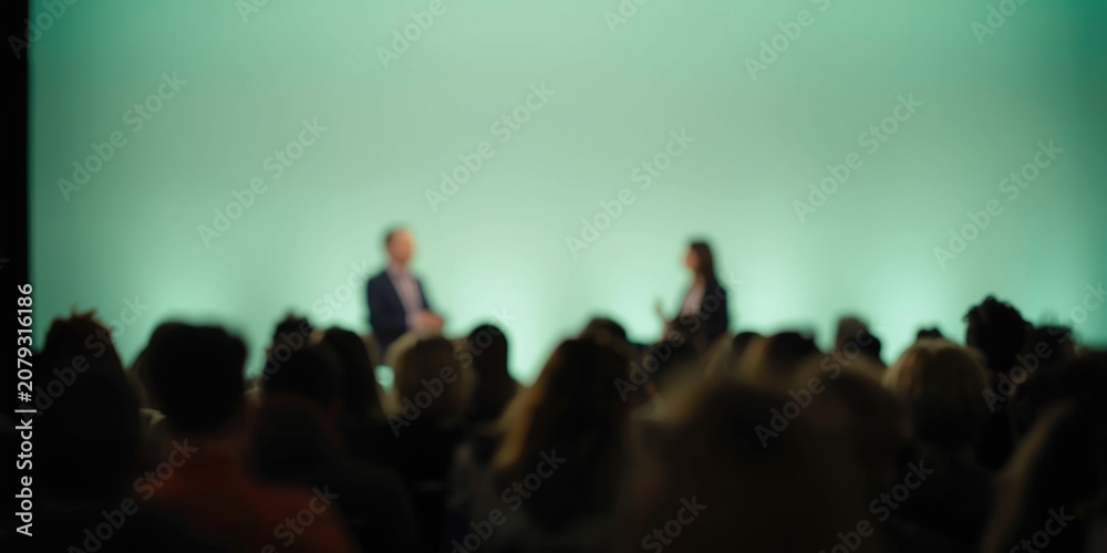 Fototapeta premium Live question and answer format set against a light green blurred background