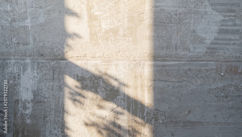 Concrete wall with shadows ...