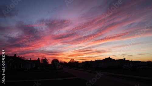Colorful sunset over suburb...