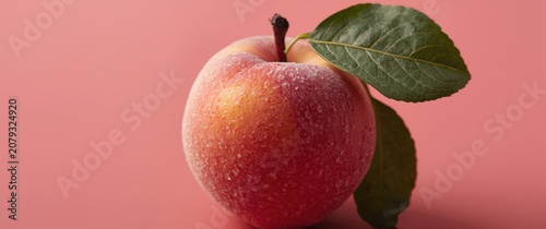Fresh red apple with a gree...