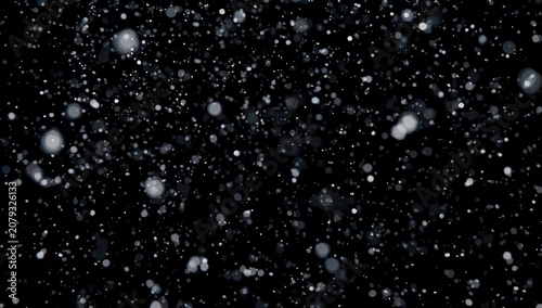 Winter season depicted by falling snowflakes against a solid black background
