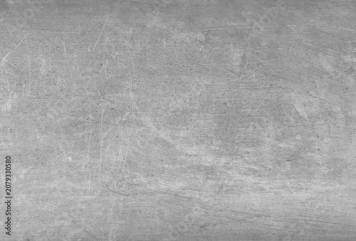 Light grey scratched concrete texture background, minimal industrial surface with copy space.