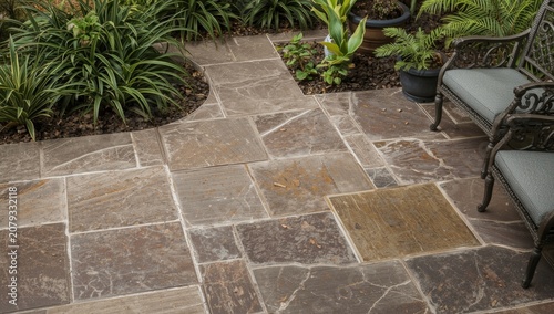 Paved stone walkway in a la...