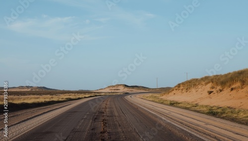 Winding road through a sand...