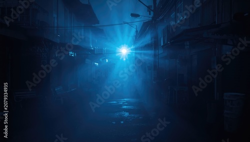 Misty alley illuminated by ...