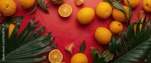 Oranges and green leaves on...